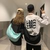 单肩包新款街头潮流大容量背包日系简约饺子包时尚潮流男女斜挎包