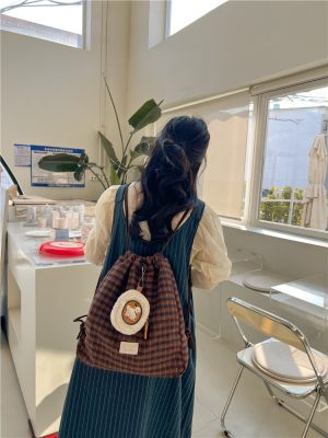 O1CN012ONbZs2EQ3jOS9JBG_2216441678738-0-cib 韩系学院风毛呢格子背包 原创复古格纹双肩包 多功能单肩女斜跨包