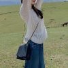 2025新款温柔风韩系上衣慵懒设计感小众女白色针织罩衫长袖针织衫