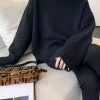 慵懒风高领针织毛衣女秋冬软糯纯色宽松内搭舒适韩系女式气质毛衣